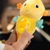 BABY EINSTEIN Hračka uklidňující se senzorem pláče mořský koník žlutý Sea Dreams Seahorse™ 0m+