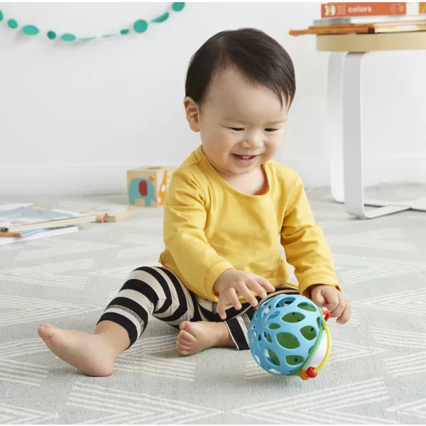 SKIP HOP Chrastítko na rozvoj motoriky kulatá do ruky 3m+